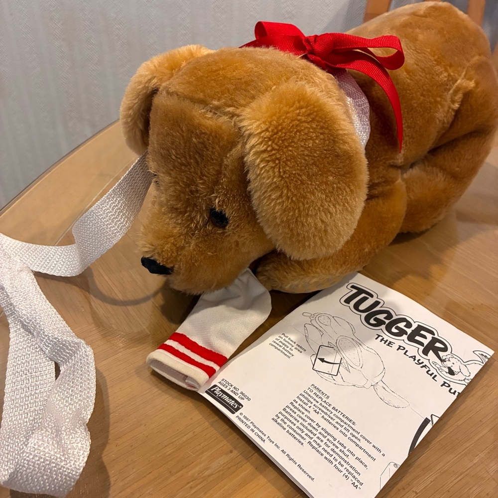 Vintage TUGGER The Playful Pup, 1997
Tan Plush Battery Operated Dog toy. WORKS.